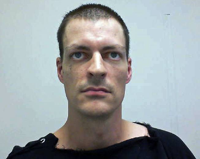 This booking photo released by the New Hampshire Attorney General's Office shows Nathaniel E. Kibby, 34, of Gorham, N.H., arrested Monday, July 28, 2014 and charged with one count of felony kidnapping of Abigail Hernandez.