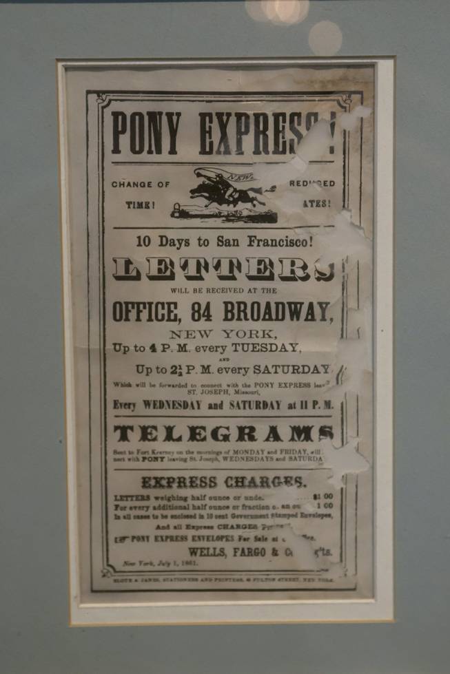 A Pony Express poster from 1861 is on display at the "Every Age is an Information Age" exhibit at the Nevada State Museum, Friday July 25, 2014. The exhibit shows 150 years of communication technology in Nevada.