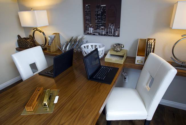A shared work area is shown in a one-story plan 1849 model home at KB Homes' Tevare residential development in Summerlin Wednesday, July 30, 2014.