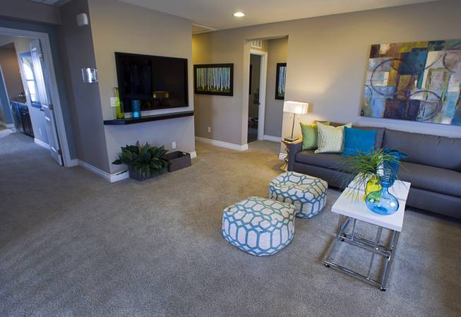 An upstairs family room is shown in a two-story plan 2568 model home at KB Homes' Tevare residential development in Summerlin Wednesday, July 30, 2014.