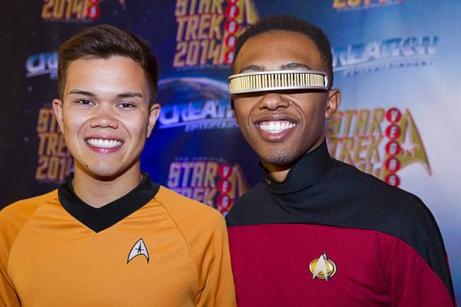 Michael Arnold, left, of Wrightwood, Calif., (as Mr. Sulu) and Desmond Franklin of Victorville, Calif. (as Lt. Commander Geordi La Forge) pose during the 13th annual Official Star Trek Convention at the Rio Thursday, July 31, 2014. The convention, expected to attract 15,000 Trekkies, runs through Sunday.