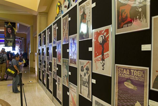 Posters promoting episodes form the original Star Trek series are displayed during the 13th annual Official Star Trek Convention at the Rio Thursday, July 31, 2014. The convention, expected to attract 15,000 Trekkies, runs through Sunday.