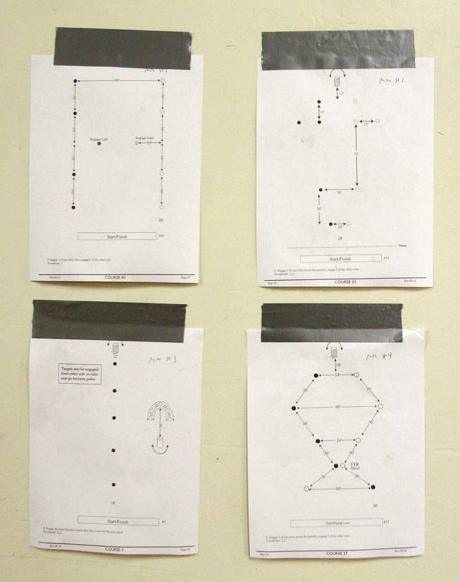 Diagrams of different courses are seen taped to the wall during the Cowboy Mounted Shooting Association's Western U.S. ChampionshipThursday, July 31, 2014 at the South Point.