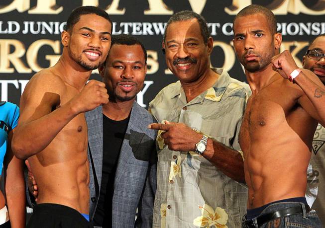 August 1, 2014, Las Vegas,Nevada ---  Shane Mosley Jr. (L) and Jerome Jones (R) weigh in (Mosley Jr  159.6 lbs , Jones 161 lbs) along with  dad/former world champion Shane Mosley (2nd L) and grandfather Jack Mosley(2ndR)  for their upcoming fight on the undercard of Brandon Rios vs Diego Chaves , Saturday, August 2 in the Chelsea at the Cosmopolitan.