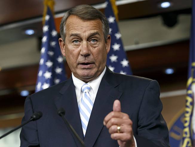 House Speaker John Boehner of Ohio defends the work of the GOP during a brief news conference on Capitol Hill in Washington, Thursday, July 31, 2014, as Congress prepares to leave for a five-week summer recess. 