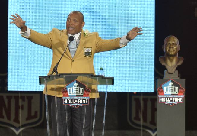 Hall of Fame inductee Aeneas Williams speaks during the Pro Football Hall of Fame enshrinement ceremony Saturday, Aug. 2, 2014 in Canton, Ohio.