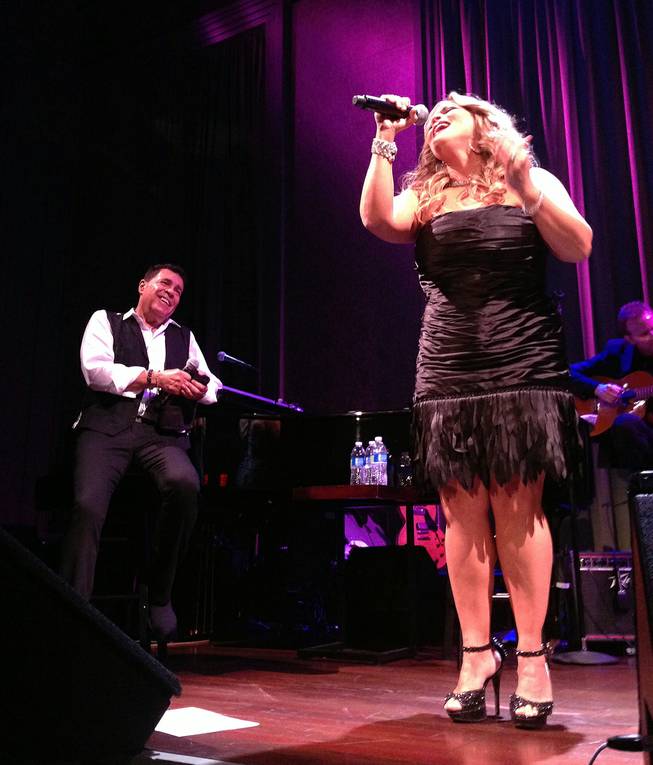 Clint Holmes is shown with special guest Elisa Fiorello, who has performed as a backing vocalist for Prince, at Cabaret Jazz at the Smith Center on Sunday, Aug. 3, 2014.