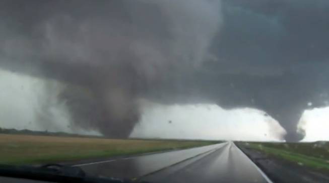 This framgrab taken from video provided by StormChasingVideo.com shows two tornados approaching Pilger, Neb., Monday June 16, 2014.  The National Weather Service said at least two twisters touched down within roughly a mile of each other Monday in northeast Nebraska.
