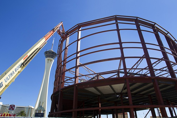 Valley Steel iron workers build a structure at the northeast corner of Sahara Avenue and Las Vegas Boulevard South Thursday, August 7, 2014. A Walgreens will occupy about half of the first floor. Wilger Enterprises is the general contractor on the project.