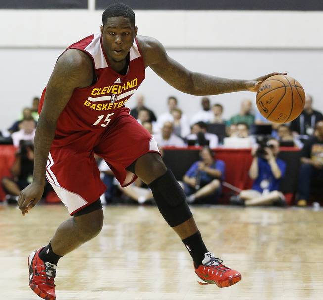 In this July 11, 2014, file photo, Cleveland Cavaliers' Anthony Bennett drives toward the basket against the Milwaukee Bucks in an NBA summer league basketball game in Las Vegas.