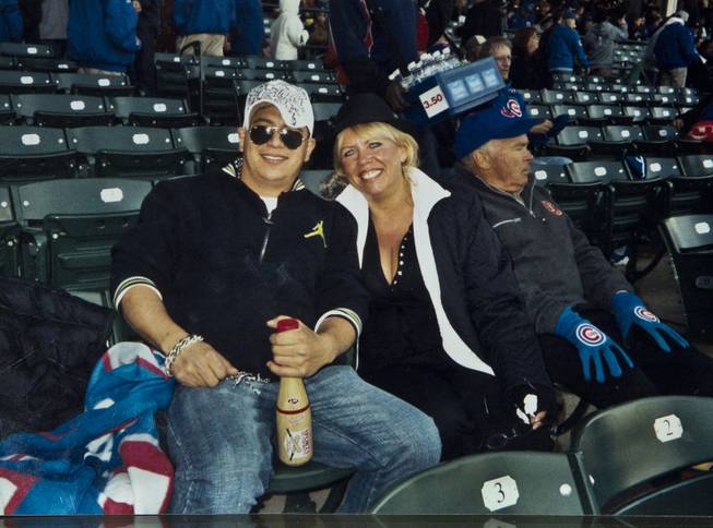 Photo of Cesar Flores and Zita Doyle' during happier times at Wrigley Field in Chicago  on Friday, August 8, 2014.
