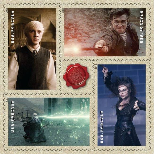 This image released by the United States Postal service shows a variety of "Harry Potter" themed Forever stamps, clockwise from top left, Tom Felton as Draco Malfoy, Daniel Radcliffe as Harry Potter, Helena Bonham Carter as Bellatrix Lestrange and Ralph Fiennes as Lord Voldemort. The USPS dedicated 20 new Forever stamps, Tuesday, Nov. 19, 2013, at Universal Orlando Resort in Florida.