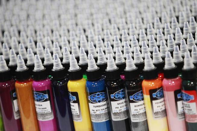 A rainbow of tattoo inks is seen on display at the 3rd annual Art-N-Ink Tattoo Festival Saturday, Aug. 9, 2014 at the South Point.