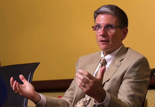 U.S. Congressman Joe Heck (R-NV) responds to a question during an editorial board meeting at the Las Vegas Sun offices Monday, Aug. 11, 2014.