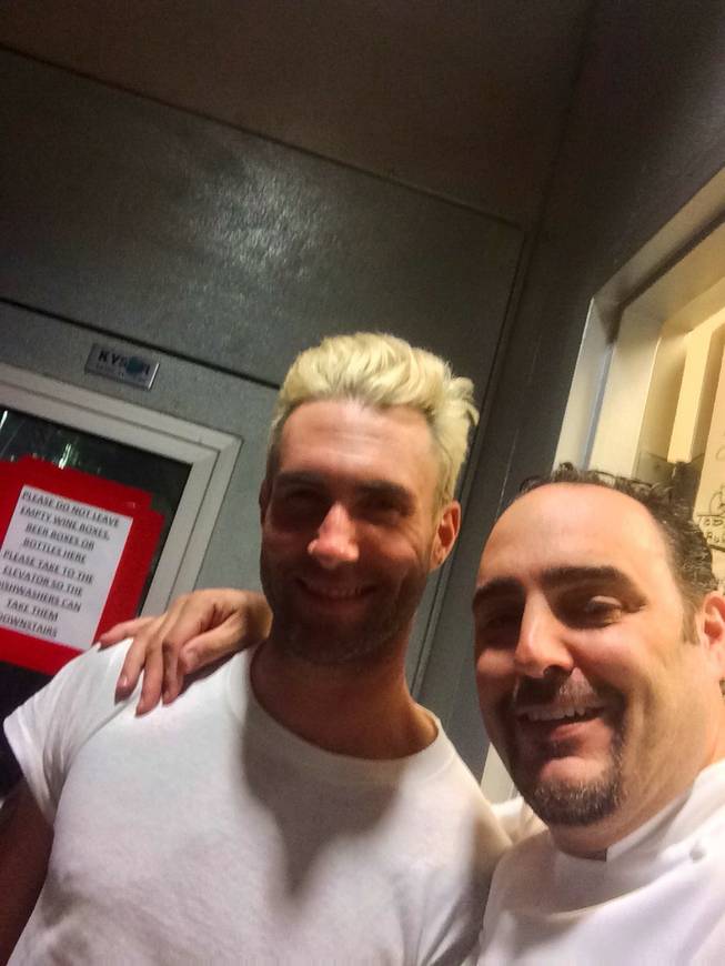 Executive chef Barry S. Dakake, right, of N9NE Steakhouse in the Palms with Maroon 5 frontman heartthrob Adam Levine.