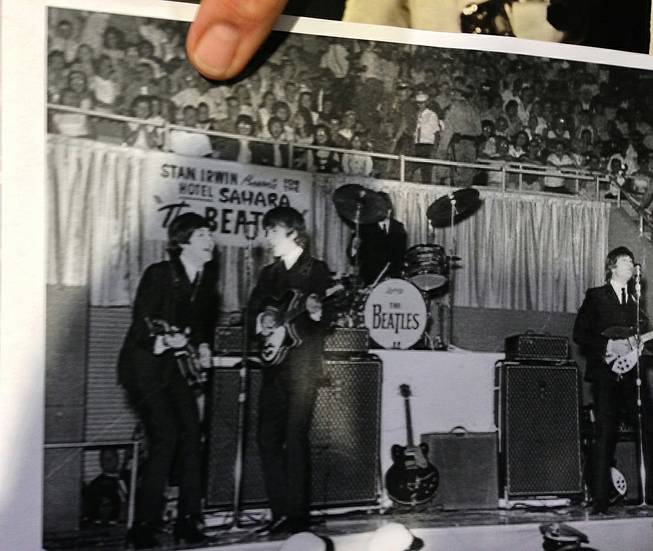 Stuart Pitz places his thumb over his head in this shot from the Beatles' Aug. 20, 1964, appearance at the Las Vegas Convention Center. Pitz attended the show with his sister and was also on hand at the 50th anniversary celebration of the Beatles' visit to Las Vegas at the Convention Center on Tuesday, Aug. 12, 2014.