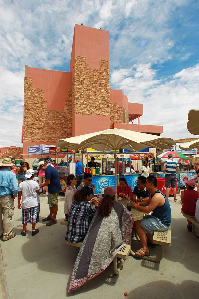 Visitors wait for their turn to tour the Skywalk at Grand Canyon West Tuesday, Aug. 12, 2014.