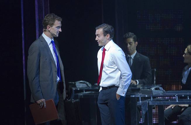 Sam (Steven Grant Douglas) talks with his friend Carl (Robby Haltiwanger) in the office during “Ghost The Musical” at the Smith Center for the Performing Arts on Wednesday, Aug. 13, 2014, in downtown Las Vegas.