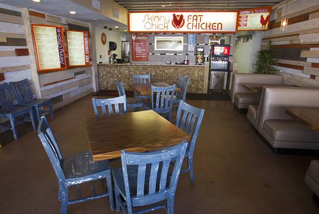 The dining area at Skinny Chick Fat Chicken, 3137 Industrial Rd., Wednesday Aug. 13, 2014.