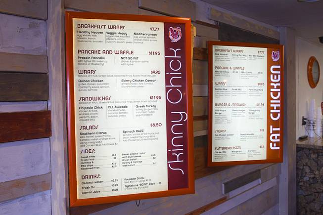 A Skinny Chick menu, left, and Fat Chicken menu are shown at Skinny Chick Fat Chicken, 3137 Industrial Rd., Wednesday Aug. 13, 2014.