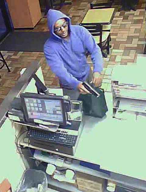 Metro Police are seeking this man in the robbery of a business near Rainbow and Charleston boulevards on July, 22, 2014.