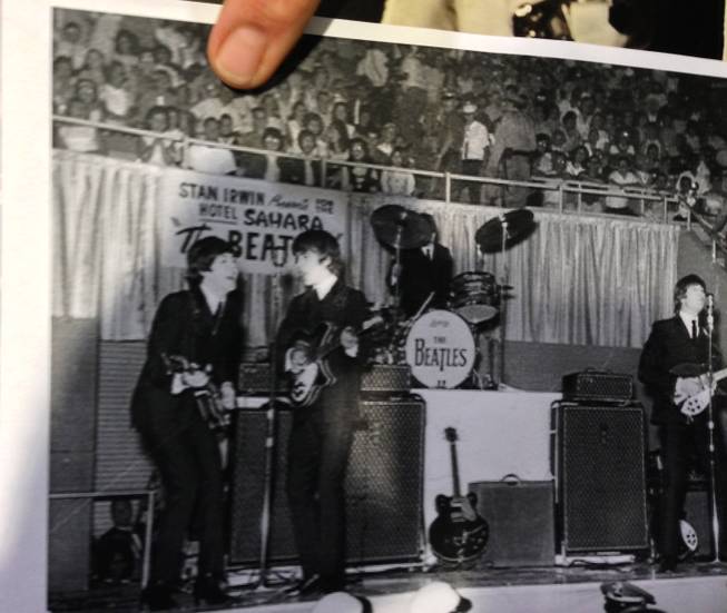 Stuart Pitz places his thumb over his head in this shot from The Beatles' Aug. 20, 1964, appearance at the Las Vegas Convention Center. Pitz attended the show with his sister and also was on hand at at the 50th anniversary celebration of The Beatles' visit to Las Vegas at the Convention Center on Tuesday, Aug. 12, 2014.