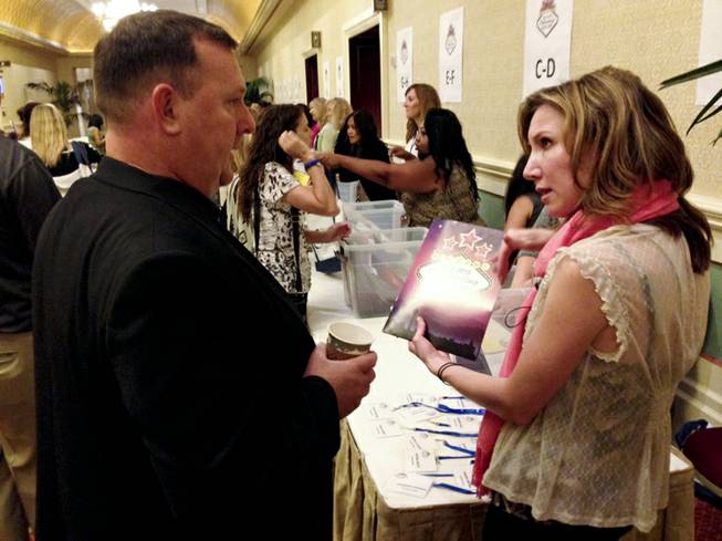 New teachers check-in for the Clark County School District teacher orientation at The Venetian on Wednesday, Aug. 13, 2014. The school district welcomed about 1,800 new teachers and long-term substitutes.