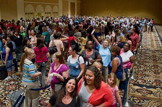 Teachers line up to pick up free school supplies during MGM Resorts annual Educator Appreciation Day at the Mirage Thursday Aug. 14, 2014. In addition to school supplies provided by MGM Resort employees, a variety of agencies participated in the days activities to introduce educators to teaching resources available in the community.