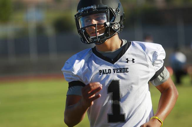 Palo Verde quarterback Graeson Vereen takes part in their first official practice Thursday, Aug. 14, 2014.