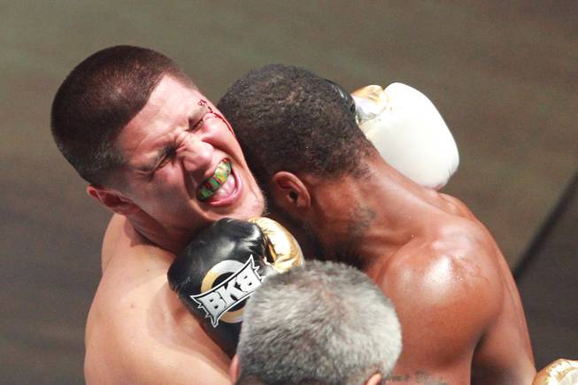 Javier Garcia winces after Darnell Jiles opened up a cut with an inadvertent head butt during their fight on the inaugural card of Big Knockout Boxing Saturday, Aug. 16, 2014 at the Mandalay Bay Events Center. Garcia won by TKO in the fifth round.