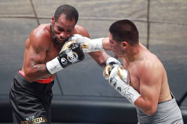 Javier Garcia hits Darnell Jiles with a right during their fight on the inaugural card of Big Knockout Boxing Saturday, Aug. 16, 2014 at the Mandalay Bay Events Center. Garcia won by TKO in the fifth round.