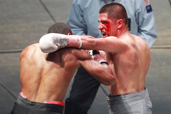 Javier Garcia hits Darnell Jiles with a left during their fight on the inaugural card of Big Knockout Boxing Saturday, Aug. 16, 2014 at the Mandalay Bay Events Center. Garcia won by TKO in the fifth round.