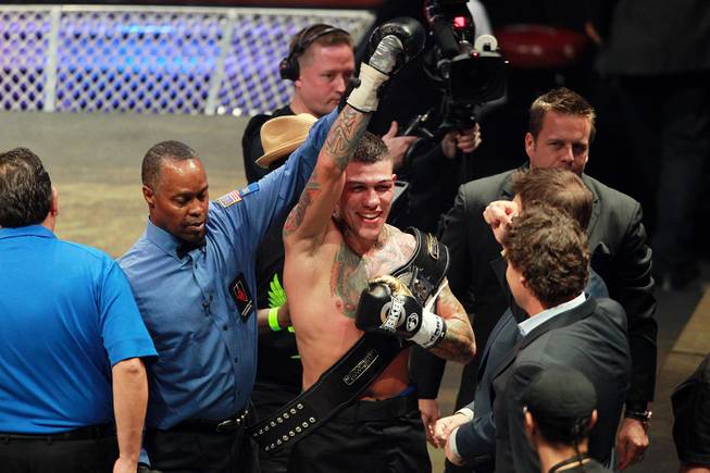 Gabe Rosado has his arm raised after his sixth round TKO Bryan Vera during their fight on the inaugural card of Big Knockout Boxing Saturday, Aug. 16, 2014 at the Mandalay Bay Events Center.