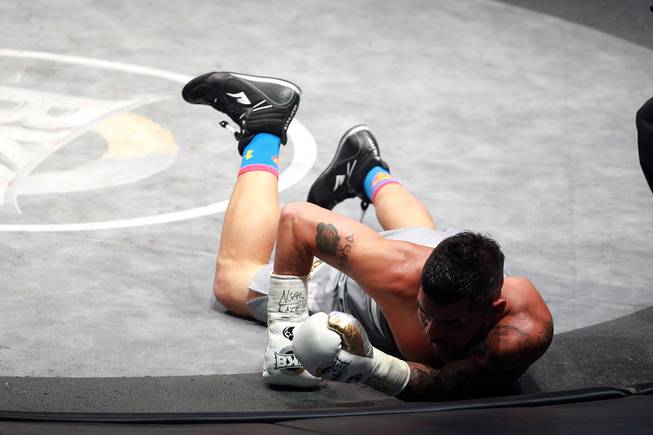 Bryan Vera hits the mat after being knocked down by Gabe Rosado during their fight on the inaugural card of Big Knockout Boxing Saturday, Aug. 16, 2014 at the Mandalay Bay Events Center. Rosado won by TKO.