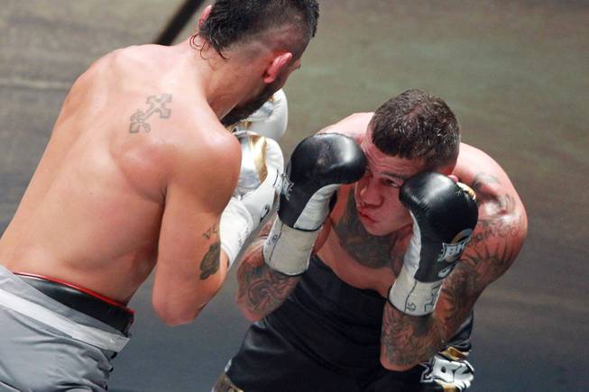 Gabe Rosado looks for an opening on Bryan Vera during their fight on the inaugural card of Big Knockout Boxing Saturday, Aug. 16, 2014 at the Mandalay Bay Events Center. Rosado won by TKO.