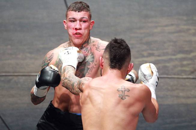 Gabe Rosado backs away from Bryan Vera during their fight on the inaugural card of Big Knockout Boxing Saturday, Aug. 16, 2014 at the Mandalay Bay Events Center. Rosado won by TKO.