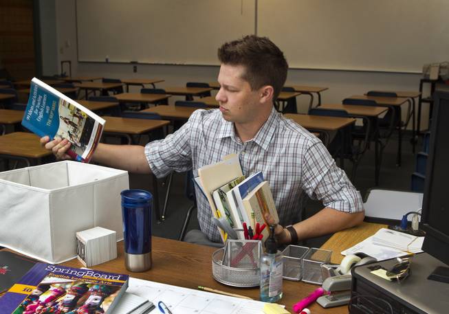 Cody Phillips begins to prepare for his first-year as a full time CCSD teacher at Del Sol High School on Monday, August 18, 2014.