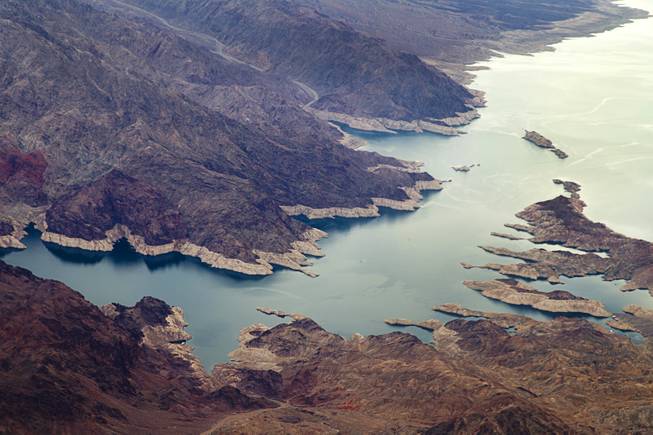 A view of the white "bathtub" ring around Lake Mead indicates the drop in water level through the years from the lake’s high point. 