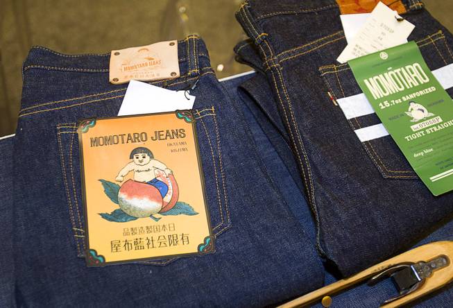 Momotaro (Peach Boy) Jeans are displayed during the Modern Assembly fashion trade show at the Sands Expo & Convention Center Wednesday, Aug. 20, 2014. The jeans take their name from a popular Japanese folktale because  the folktale is believed to have originated in Okayama, Japan where the company is based. The show is a collection of six shows: The Accessories Show, Agenda, Capsule, Liberty, Mrket, and Stitch.