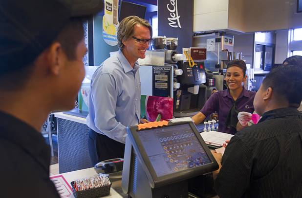 James Vance, owner-operator of eight local McDonald's franchises, chats with employees in his McDonald's at 6990 S. Rainbow Blvd. Wednesday, Aug. 20, 2014. Vance is also president of the Greater Las Vegas McDonalds Owner Operators Association. Since 1999, the local effort has awarded more than $3.1 million in Ronald McDonald House Charities scholarships, helping more than 1,300 Southern Nevada high school students.