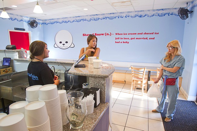 Michelle Francia helps Jane Park, center, and Jenny Lam with an order at Snowflake Shavery, 5020 Spring Mountain Rd., Thursday, Aug. 21, 2014.