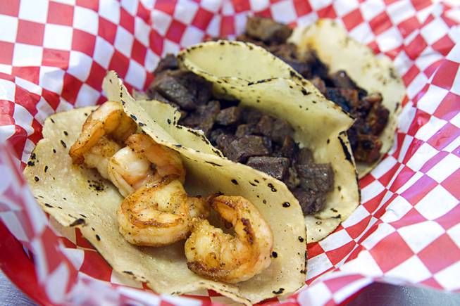 A Taco Trio (shrimp, carne asada and adobada tacos) before toppings at Saborr, a Mexican fast food restaurant at 4348 E. Craig Rd., Thursday, Aug. 21, 2014.