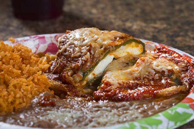 Chile Relleno (sliced to show cheese) at Saborr, a Mexican fast food restaurant at 4348 E. Craig Rd., Thursday, Aug. 21, 2014.