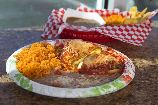 Chile Relleno (sliced to show cheese) at Saborr, a Mexican fast food restaurant at 4348 E. Craig Rd., Thursday, Aug. 21, 2014.