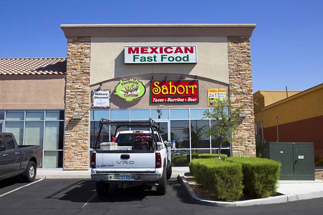 An exterior view of Saborr, a Mexican fast food restaurant at 4348 E. Craig Rd., Thursday, Aug. 21, 2014.