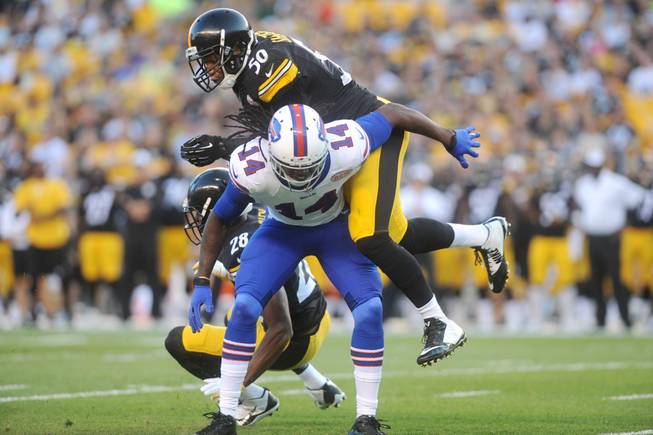  Pittsburgh Steelers outside linebacker Ryan Shazier (50) hits Buffalo Bills wide receiver Sammy Watkins (14) in the first quarter of the NFL football preseason game on Saturday, Aug. 16, 2014 in Pittsburgh.