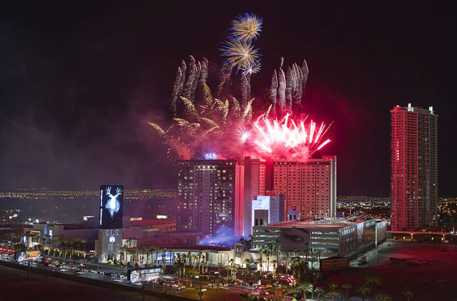 Fireworks explode during the grand opening of SLS Las Vegas, formerly the Sahara, in the early hours of Saturday, Aug. 23, 2014. 