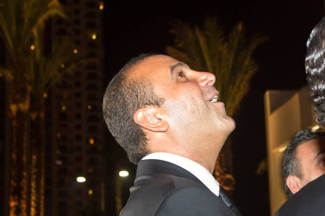 Sam Nazarian, founder, chairman and CEO of SBE, watches the fireworks display above SLS Las Vegas during the grand-opening celebration Saturday, Aug. 23, 2014, on the Strip.