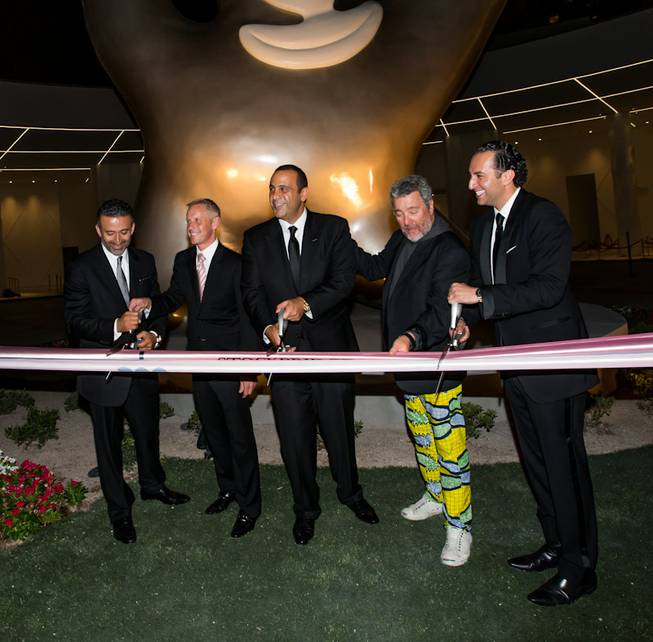 Arash Azarbarzin, president, SBE Hotel Group; Rob Oseland, president and COO, SLS Las Vegas; Sam Nazarian, founder, chairman and CEO, SBE; designer Philippe Starck; and Sam Bakhshandehpour, president, SBE, at the grand opening of SLS Las Vegas on Friday, Aug. 22, 2014, on the Strip.