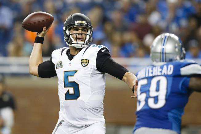 Jacksonville Jaguars quarterback Blake Bortles (5) passes the ball against the Detroit Lions during a preseason NFL football game at Ford Field in Detroit, Friday, Aug. 22, 2014.